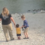 SMGO Vice Pres. & Founder walks with the children on the Maumee River near her home.
